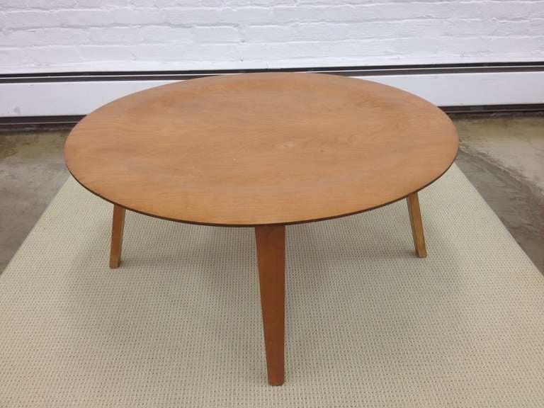Early example of the CTW coffee table designed by Charles and Ray Eames.  This is an from an early Evans production.  Beautiful aged patina.