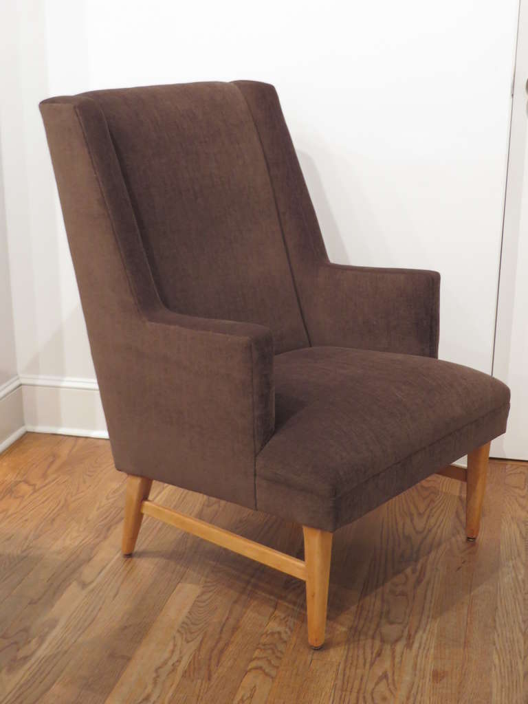 Elegant wing chair recently reupholstered in a soft brown wool fabric
