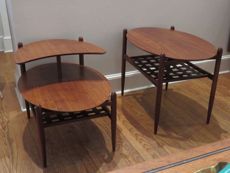 Pair of end tables or side tables in the same style but in different shapes.<br />
They were recently refinished : the tops in natural walnut color, the frame slightly darker.
