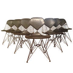 Set of Seven Eames Dining Chairs With Bikini Pads and Eiffel Bases