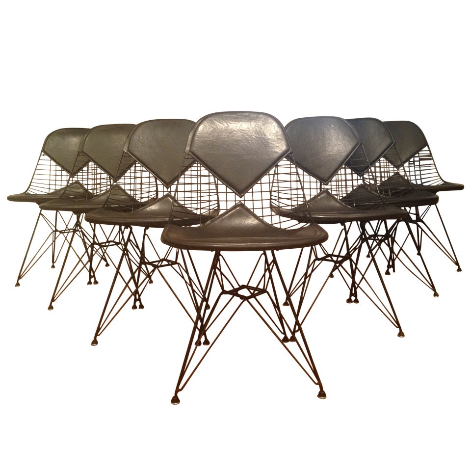 Set of Seven Eames Dining Chairs With Bikini Pads and Eiffel Bases