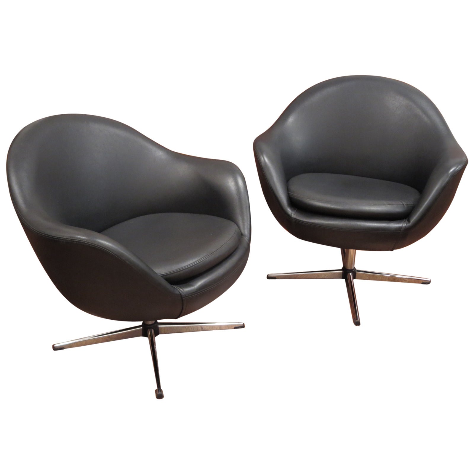 Pair of 1960's Overman Swivel Chairs