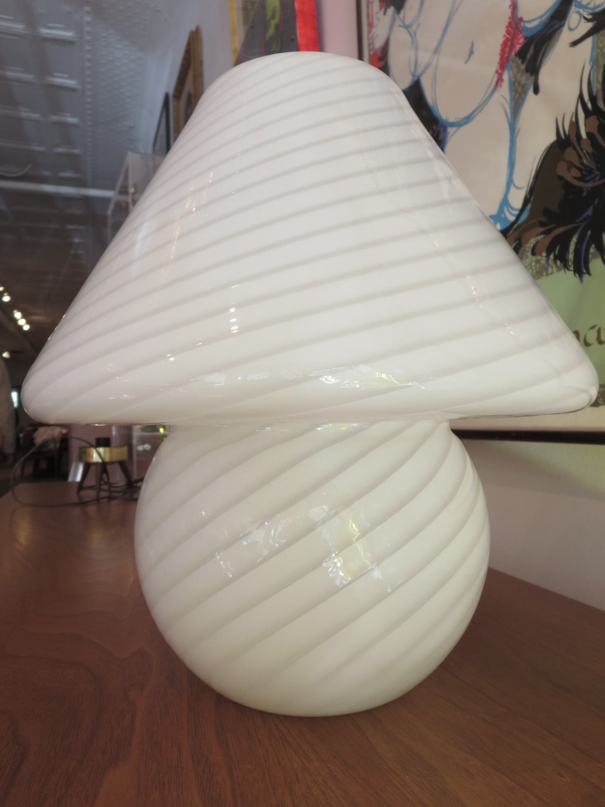 One piece hand blown Murano swirled glass table lamp from the 1970's.  Very appealing when illuminated.