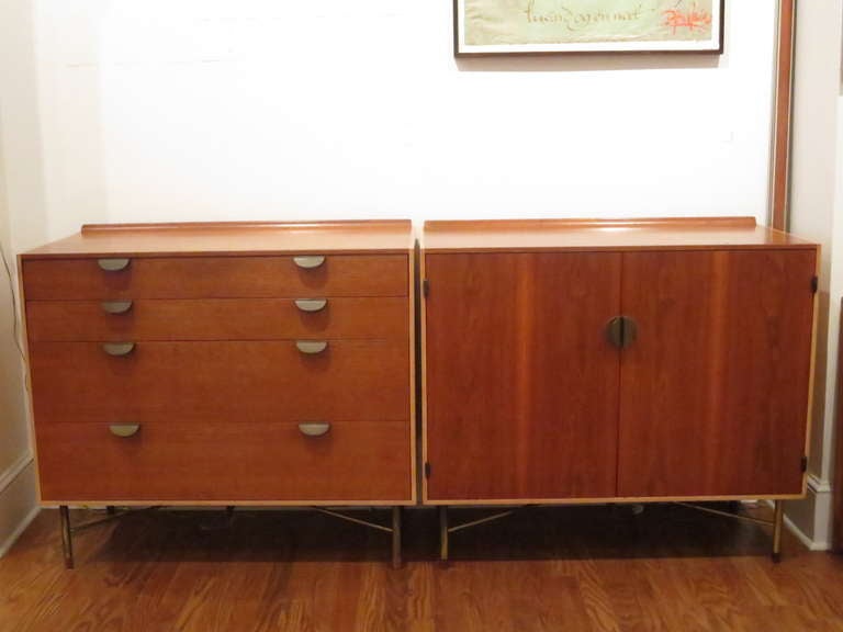 Two piece server designed by Finn Juhl for Baker from the 1950's.  Generous storage consisting of drawers and shelves. Juhl's utilization of different wood tones  adds depth to the overall design.   Can be used as two separate pieces.