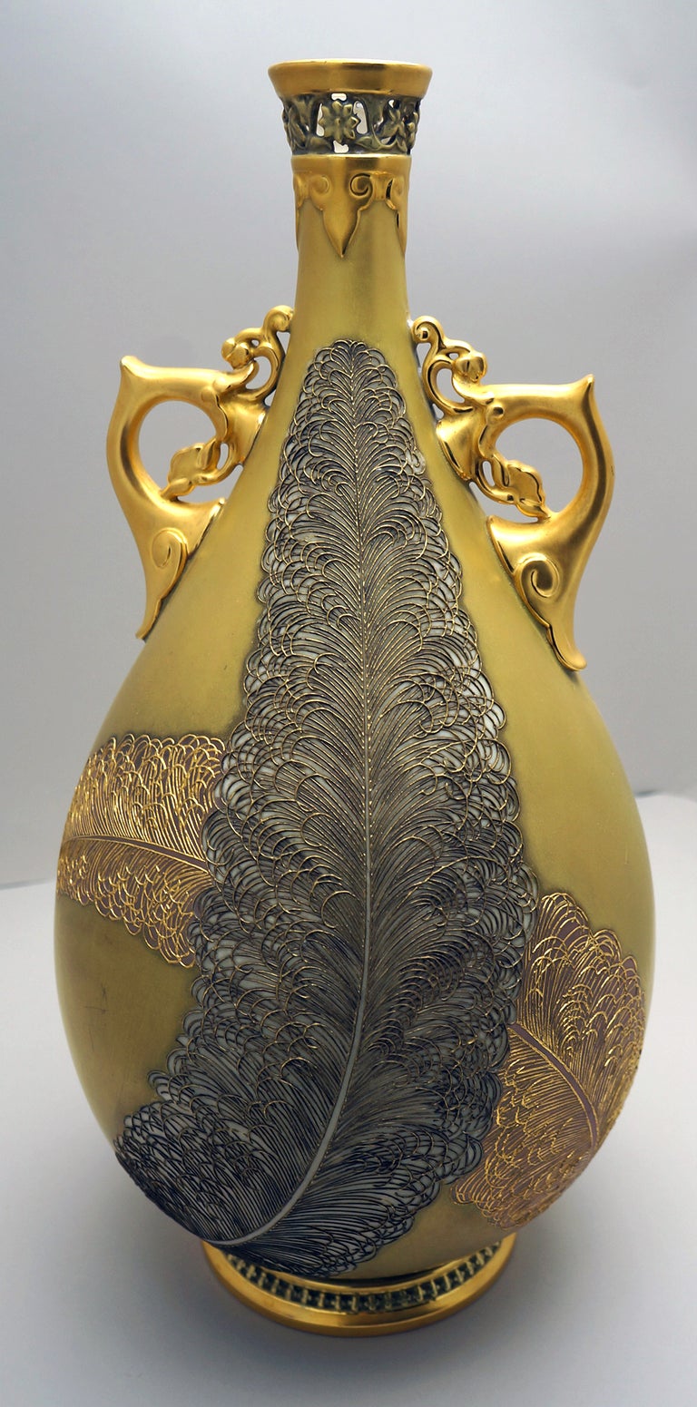 This 19th c, Worcester vase, made for Tiffany and Company exemplifies the Aesthetic Movement design to the fullest! The combination of matte gold body, bright gold trim and handles, platinum/silver and rose gold create a lovely layered effect of 3