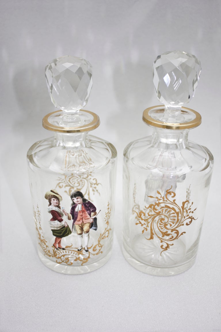 Austrian Bohemian Crystal Dresser Bottles, Pair with Hand-Painted Enamel Figures and Gold