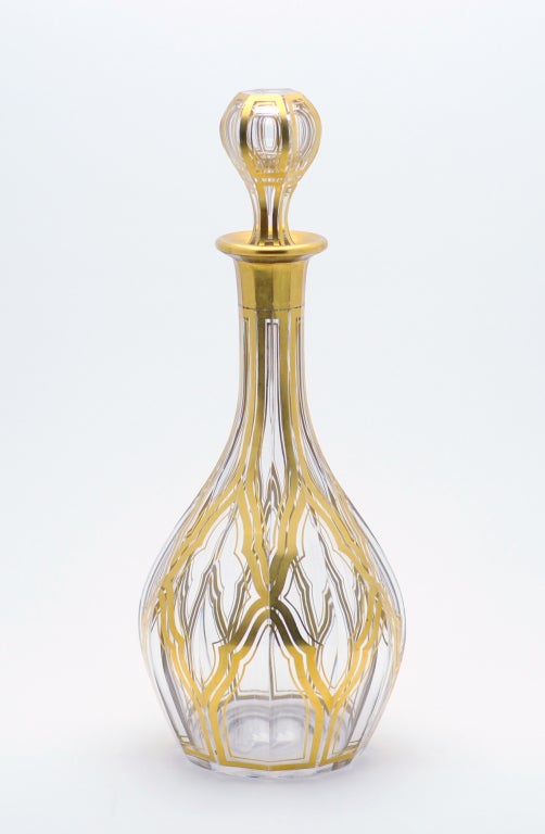 19th C. Baccarat hand blown crystal decanter with panel cutting and Neoclassical gold enamel decoration. The condition of the gold leaf is impeccable!