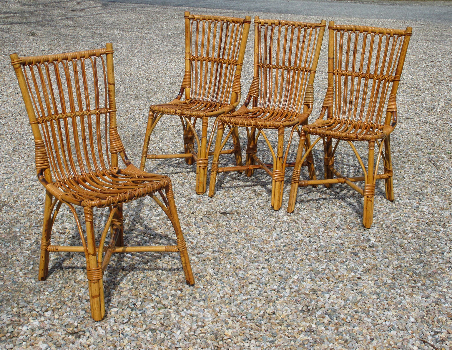 Set Of Four Stick Wicker Dining Chairs