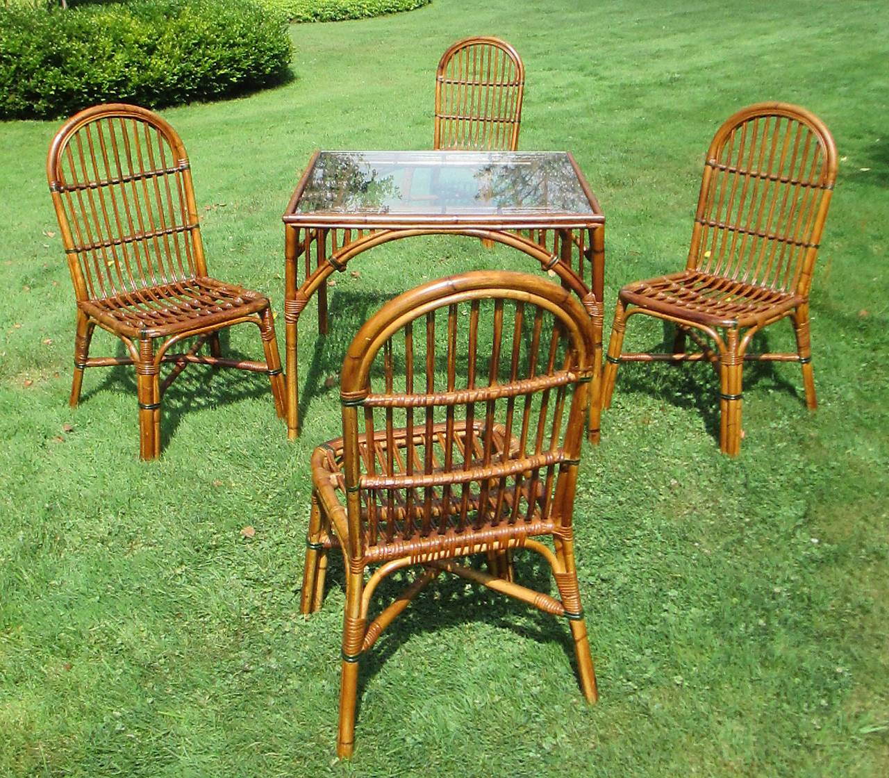 Stick Wicker breakfast/game table & four chairs in natural stained finish with green painted trim.  6