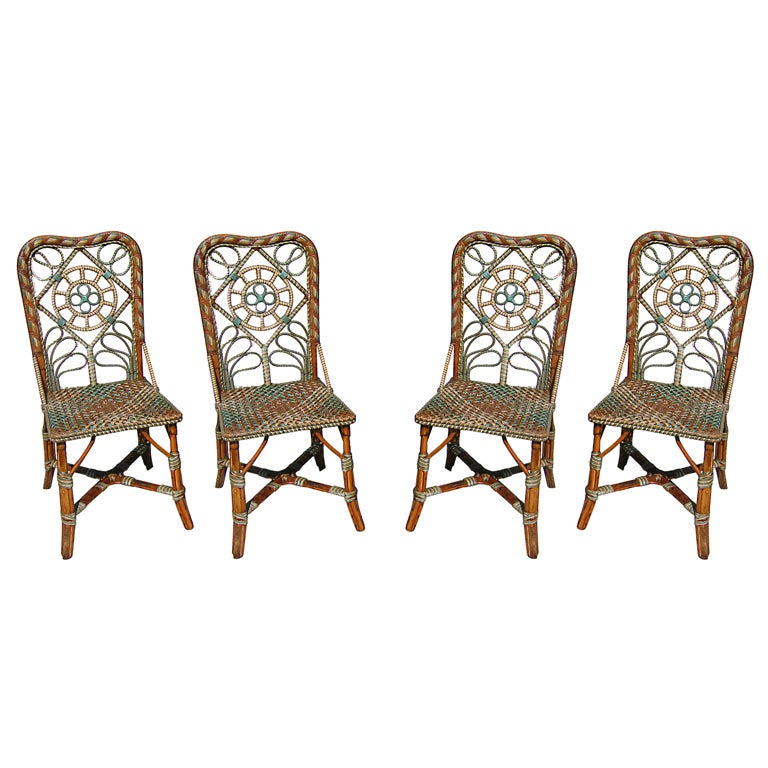 SET OF FOUR FRENCH WICKER BISTRO CHAIRS at 1stDibs