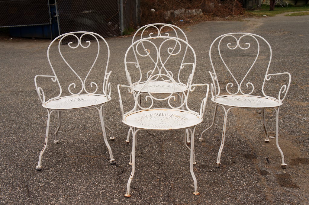 Set of 8 French bistro garden arm chairs.  Arm height 23