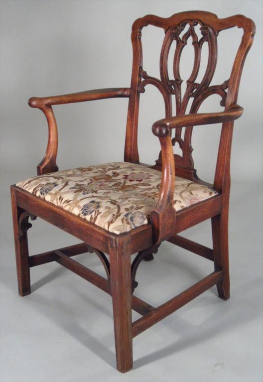 George III mahogany armchair, late 18th C., pierced back splat above slip seat, raised on square legs.

Keywords:  George II armchair, chippendale period armchair.