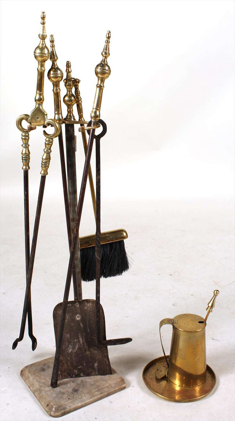 Antique Federal style cast brass and wrought iron fire tools including, stand, tong, shovel, broom, two pokers. Seven pieces. Stand is 31