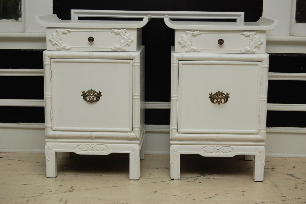 Pair of Painted chinoiserie painted night tables.  Wonderful proportions with faux bamboo trim and pagoda shape top.<br />
<br />
Night stands