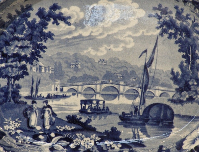 Medium sized platter in medium blue and white Staffordshire
transfer ware ca. 1840. The subject is the bridge over the Themes River between Middlesex and Surry. It is the oldest surviving bridge in the London area. The bridge was built 1774-1777