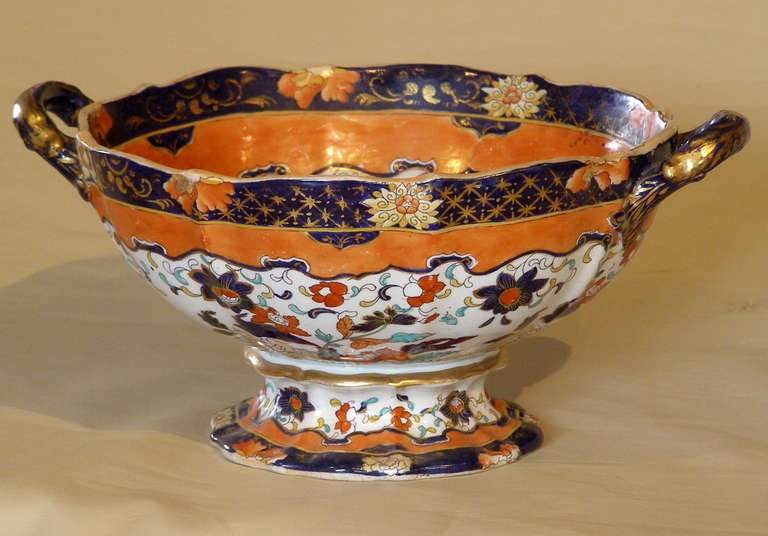 Wild color combinations are the hallmark of Mason's Victorian era Ironstone. This is no exception with  dark blue, orange and red, etc. The bottom is additionally marked by the Irish merchant  Higginbotham & Son, Sackville Street, Dublin. The length
