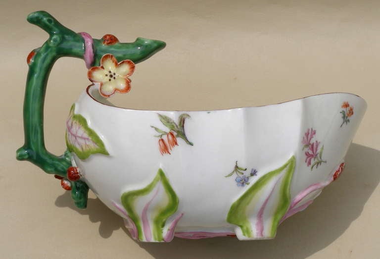 Just exquisite. This is my favorite porcelain item in my inventory. The short lived Chelsea Factory (1744-1769) produced some of the finest examples produced in England in the 18th century. 

The molded and painted decoration is of the wild