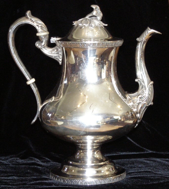 A handsome tea pot by Thomas J. Megear (b. 1809) who worked in Wilmington 1831-32 and Philadelphia 1833-1857. It is quite heavy for its size, 42.2 troy oz.. It has an engraved 