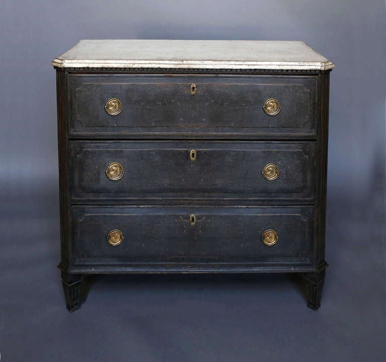 Black painted Gustavian style chest of drawers, Sweden circa 1850. Dentil detail around the top and canted corners. Later brass hardware in the neoclassical style.