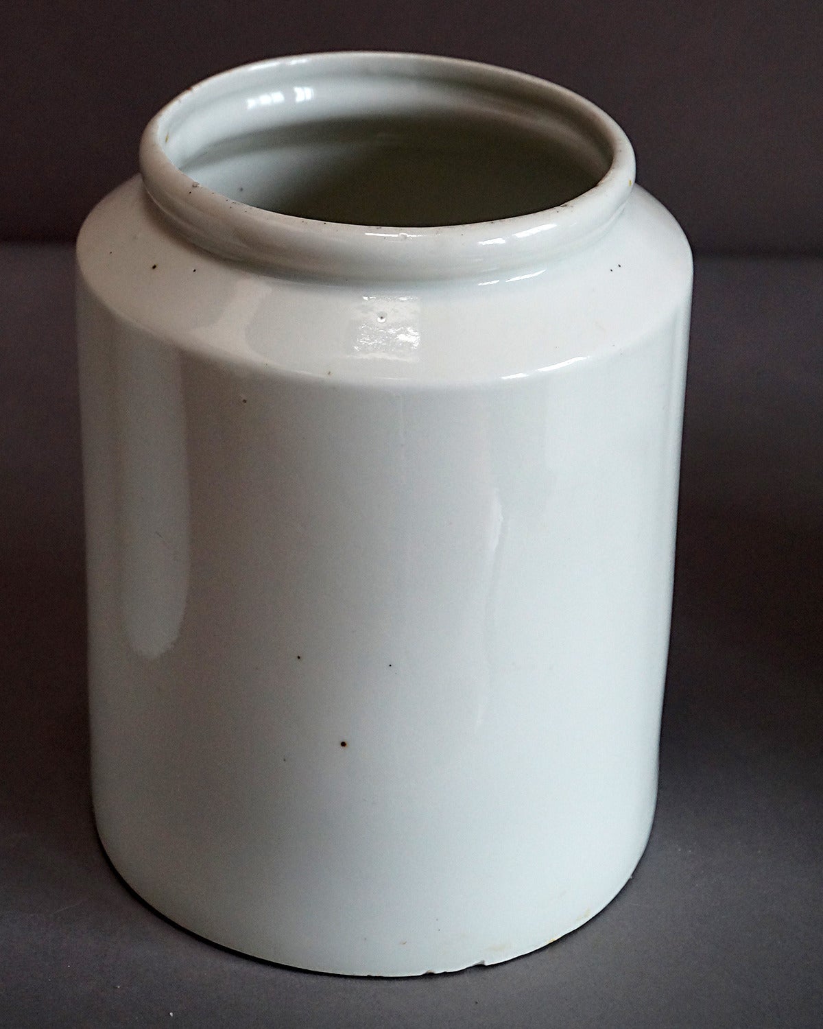 Set of 3 white stoneware storage jars, Sweden circa 1910.