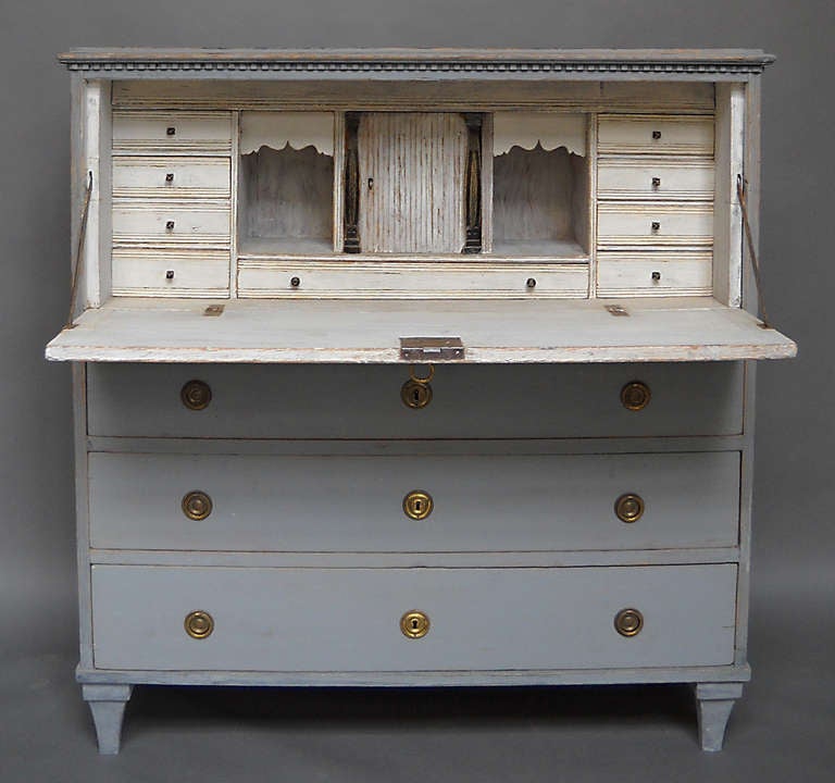 Gustavian writing desk, Sweden circa 1810, with fall front over three drawers. Interior has two banks of drawers, a central cabinet with applied half columns, and three hidden compartments. Original brass hardware.

For close-up photos, 