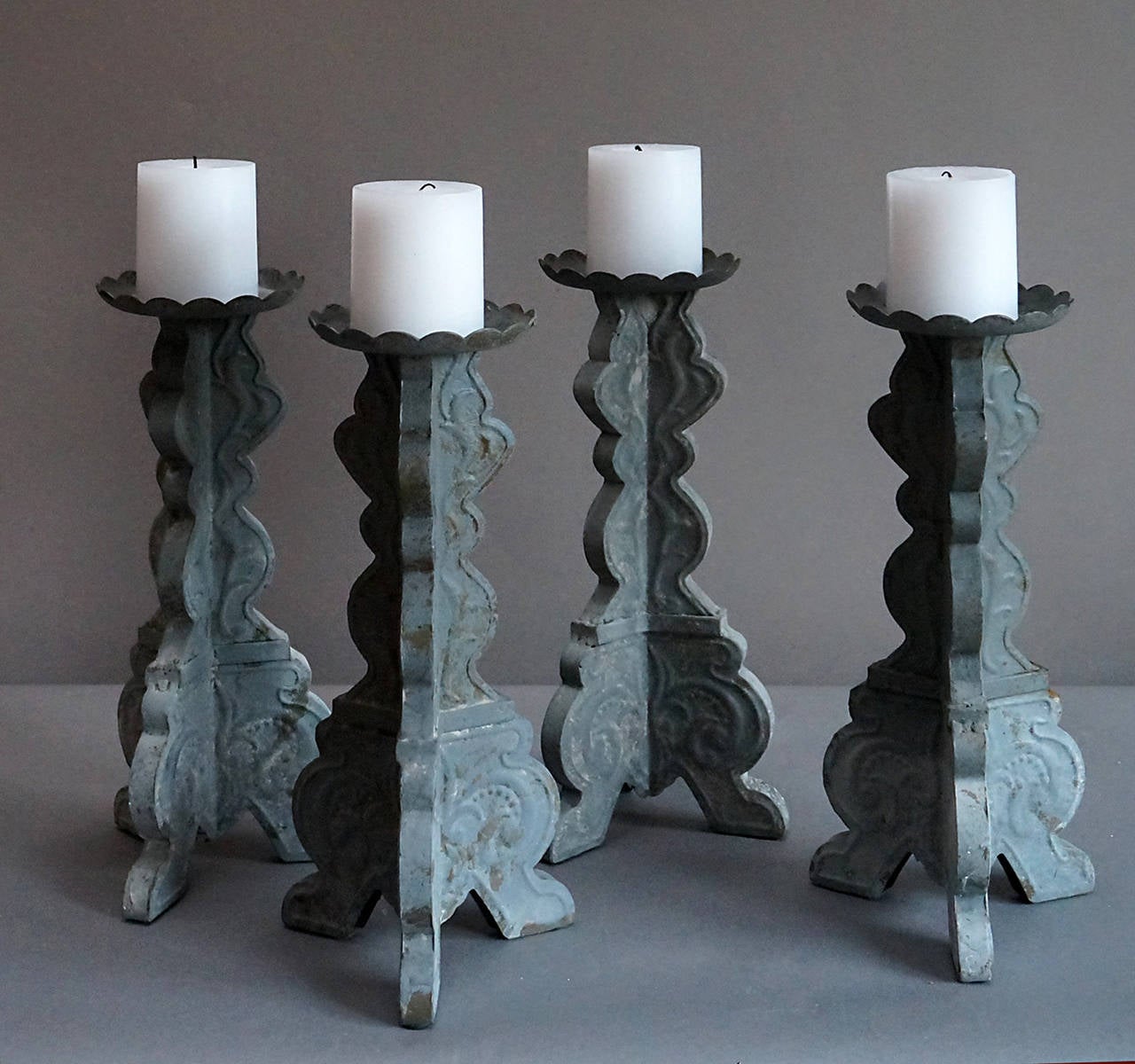 Set of Four Tin Candlesticks