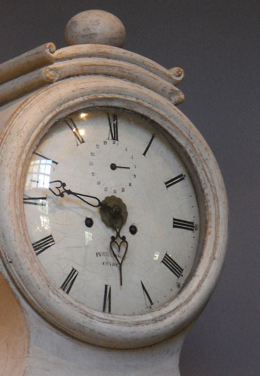 Swedish tall case clock in white paint, circa 1810, from Gryt in Östergötland on the east coast. The movement is of very high quality, solid brass, with a calendar and alarm, and a spiral gong as well as a bell. The clock strikes the hour on the