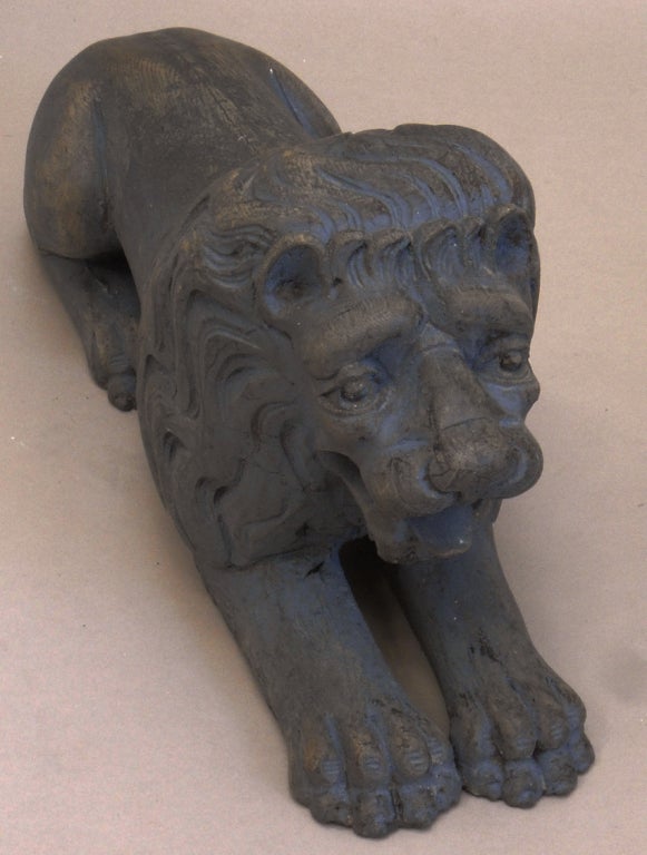 Wood Pair of Carved Lions Couchant For Sale