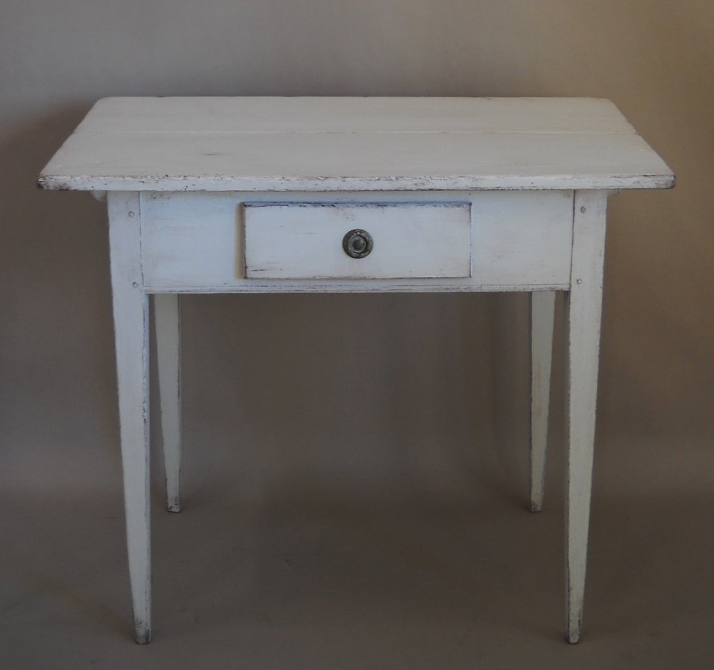 Swedish side or work table in simplified Gustavian style, circa 1850. Single apron drawer and tapering legs. Useful small size.