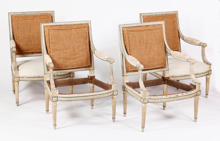 A Set of Four Louis XVI Painted Fauteuils 
Att. to Jean-Baptiste Claude Sene
18th Century

Attributed to Jean-Baptiste Claude Sene Maitre 1769

Each with a rectangular padded back and seat, within a guilloche-carved seat frame, on fluted