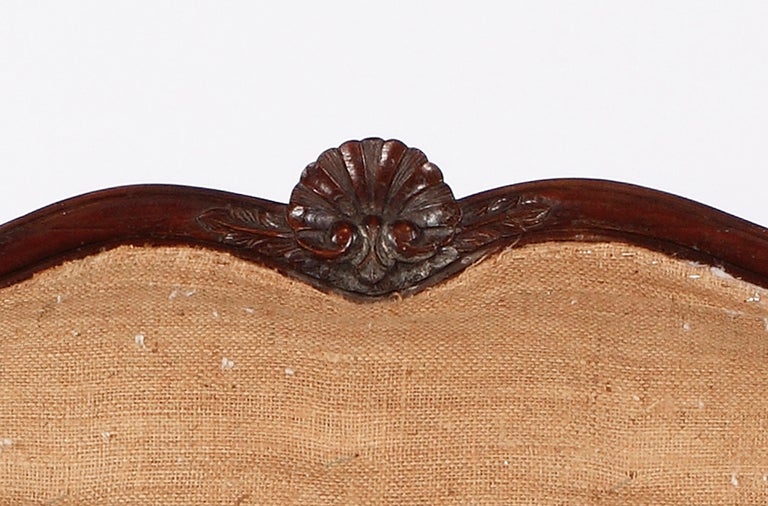 French A Regence Carved Stained Beechwood Canapé, 18th Century For Sale