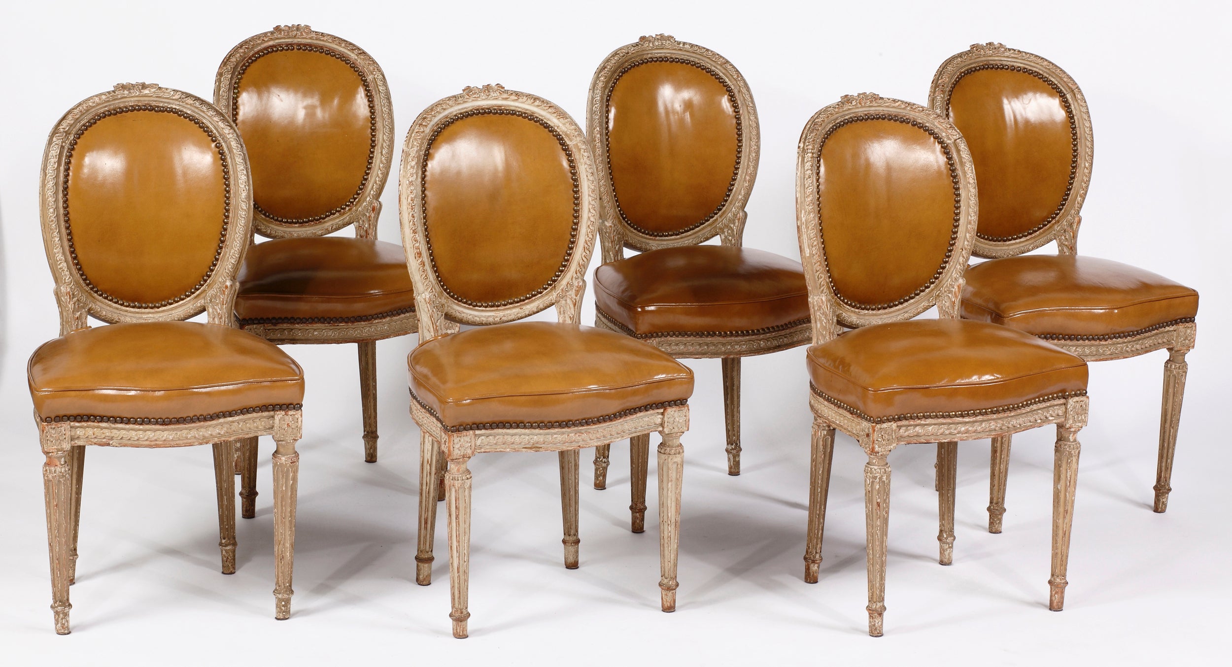 A Set of Louis XVI Painted Side Chairs Attributed to Claude Sene