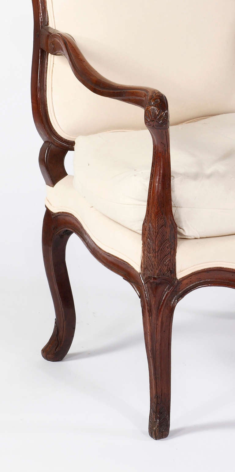 French A Fine Early Louis XV Walnut Fauteuil Attributed Pierre Nogaret, 18th Century For Sale