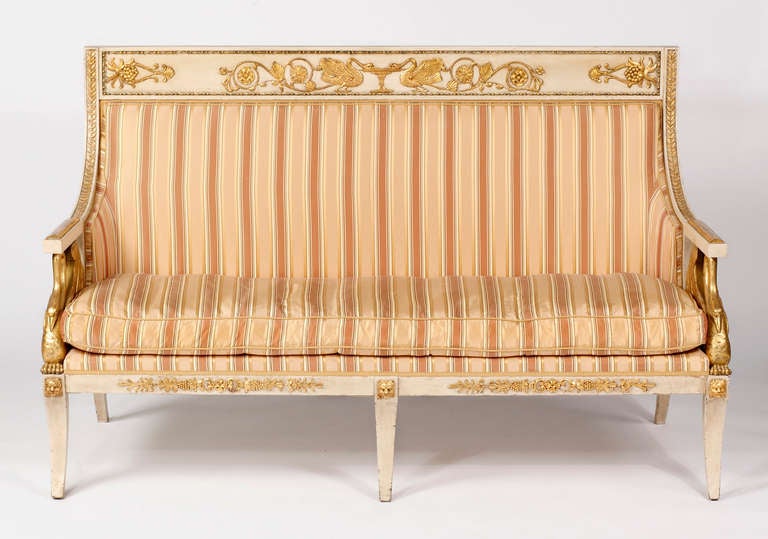 An Important Italian Neoclassical
Painted & Parcel Gilt Canapé 
First Quarter 19th Century
Lombardy, Italy

The back rest with paneled top rail decorated with swans flanking a fountain, the wooden armrests raised on swan-shaped supports, the seat