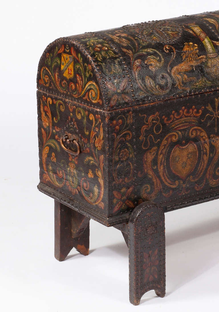 An Early Continental Polychromed 
Dome Trunk on Stand
18th Century

The trunk is covered and decorated throughout in polychrome tooled leather.

Height 34 in.  Width 50 in.  Depth 18 in.

Tr. INV. 1