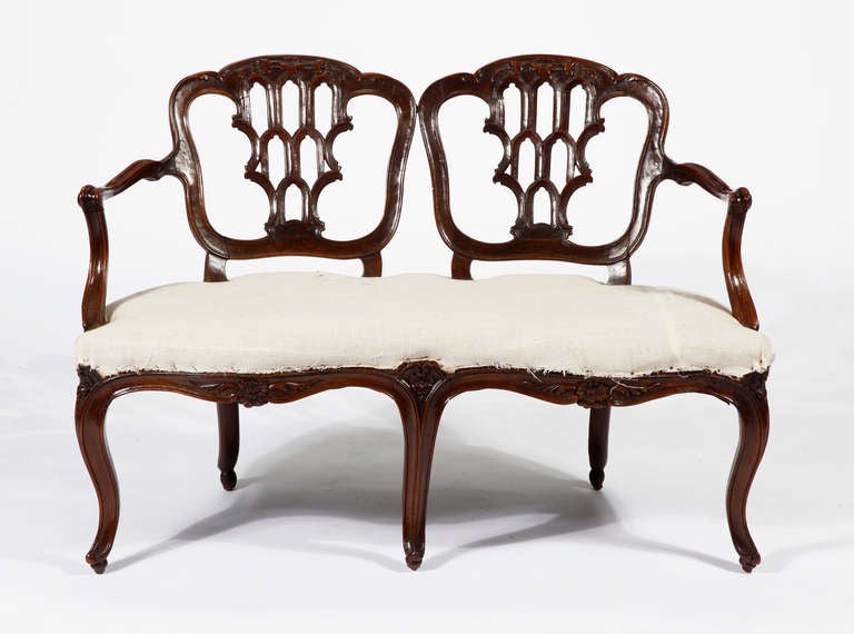 A Rare Portuguese Settee
Mid 18th Century

Height 30 in.  Width 43 in.  Depth 19 in.

Identical chair in the National Museum of Antiques Art, in Lisbon
Reference: “World Furniture”, by Helena Hayward, pg. 162

Sof 7