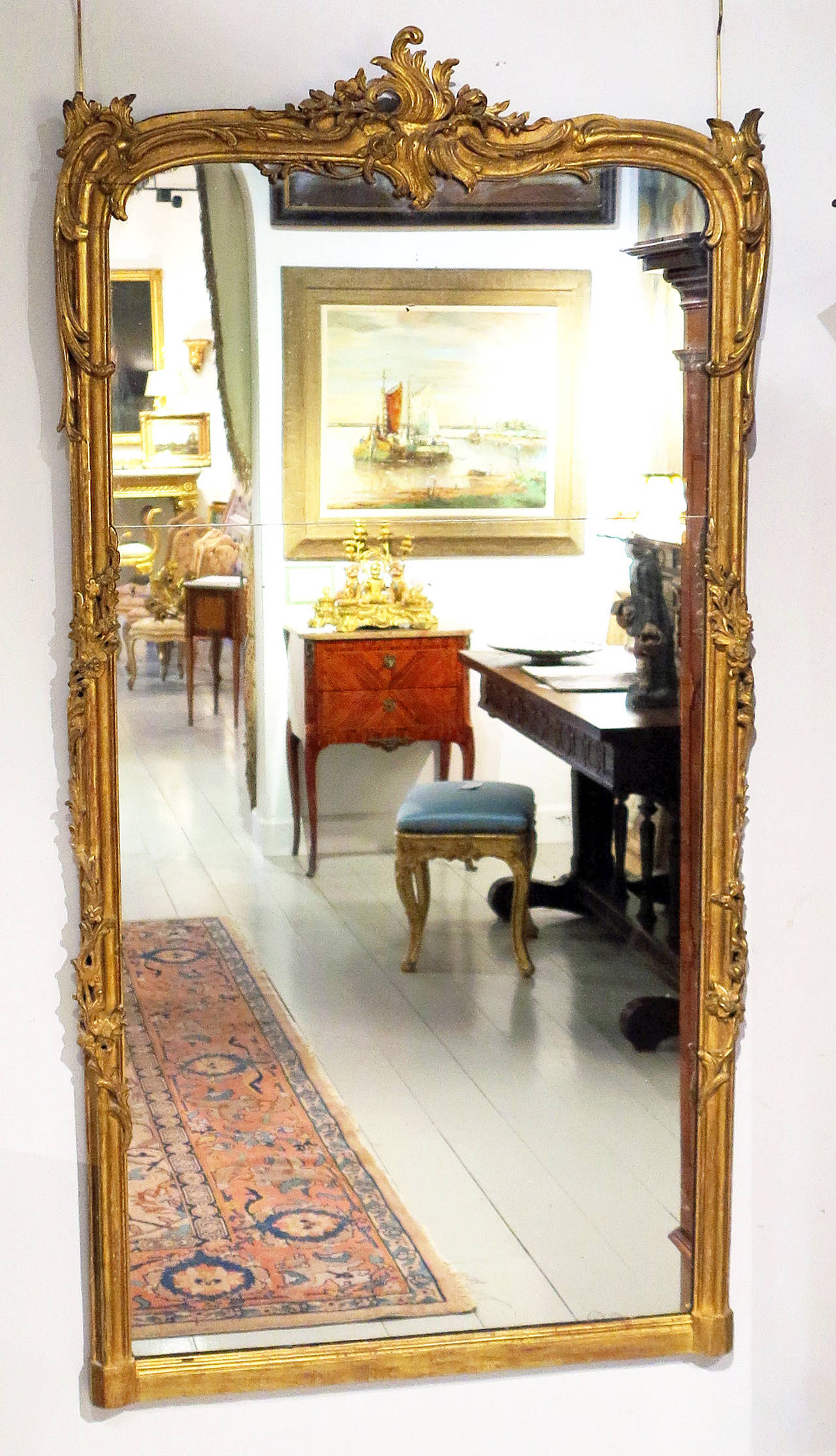 A Louis XV/XVI Transitional 
Giltwood Mirror
18th Century

Height 72 in.  Width 36 in.

Provenance:
Private Collection, Greenwich Ct.
Le Trianon Fine Art & Antiques

Mir194