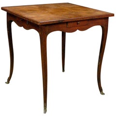 A Louis XV Chestnut Leather Top Games Table
