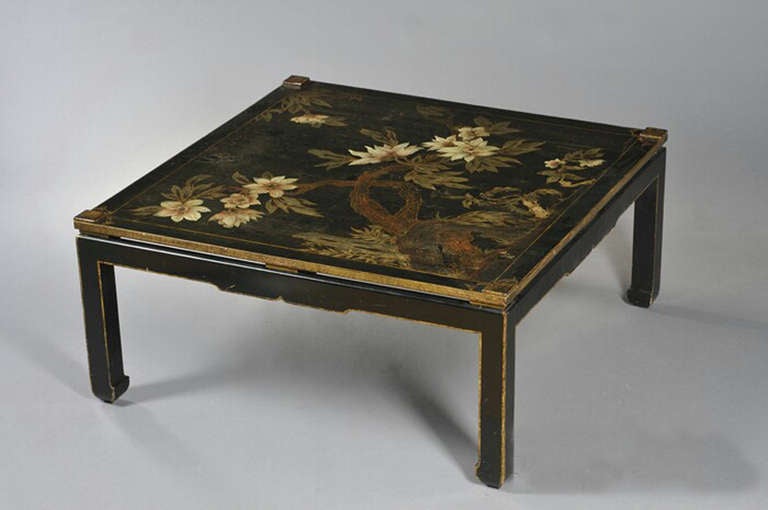A George III Style Chinoiserie Low Table
Early 20th Century

The square top with polychrome landscape scene, 
on four square legs

Height 18 in.  Width 40 in.  Depth 40 in.

Provenance:
Property of a Lady, Greenwich, CT.

Tab 130