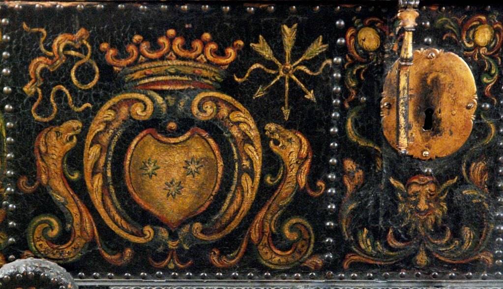 The trunk is covered and decorated throughout in polychromed tooled leather.