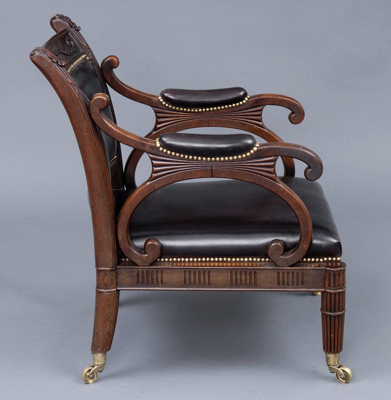 British English Regency Carved Mahogany and Leather Library Armchair For Sale