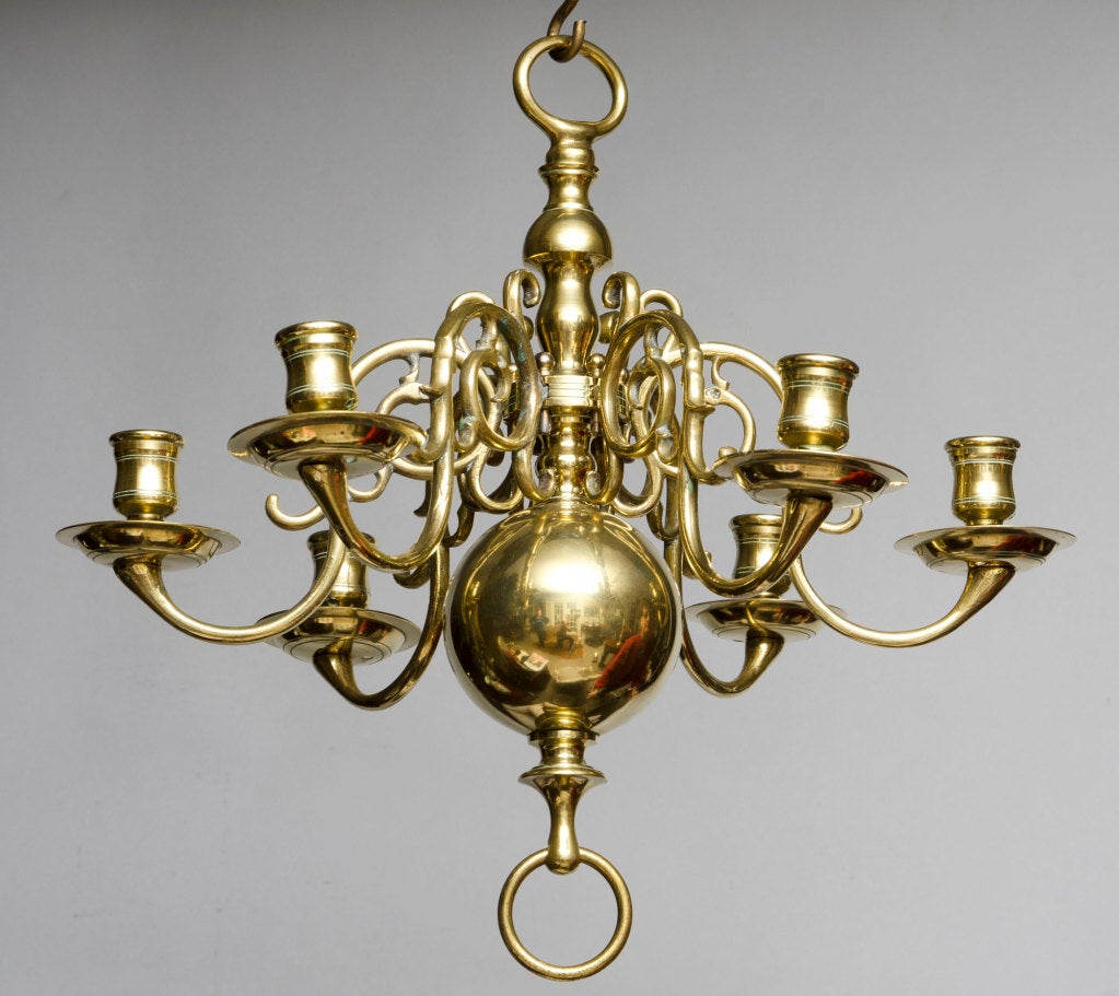 Charming small Dutch brass six-arm chandelier, the scrolling mounted branches emanating from the bulbous  knopped column terminating in a large ball.  Presently not electrified.