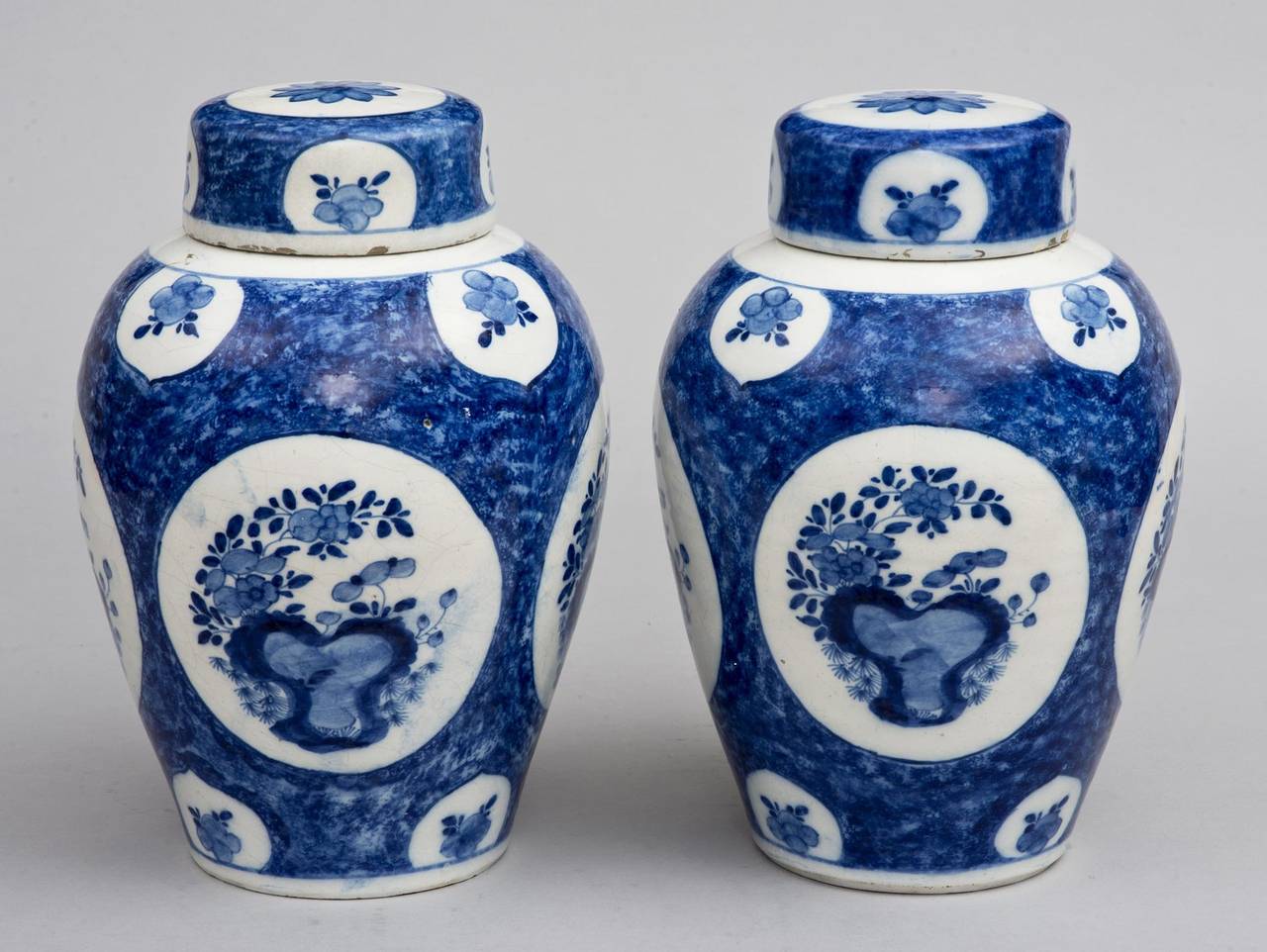 18th Century and Earlier Pair of 18th Century Dutch Delft Vases and Lids