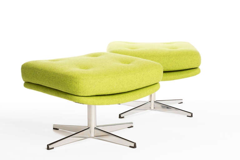 A pair of fabulous, bright green heathered felt swivel stools by Stendig with attached tufted cushions and chrome bases. Newly polished and newly upholstered in luxurious Maharam fabric.