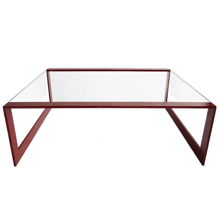 In glossy cherry-red powder coat this architectural oversize steel frame coffee table supports 1/2