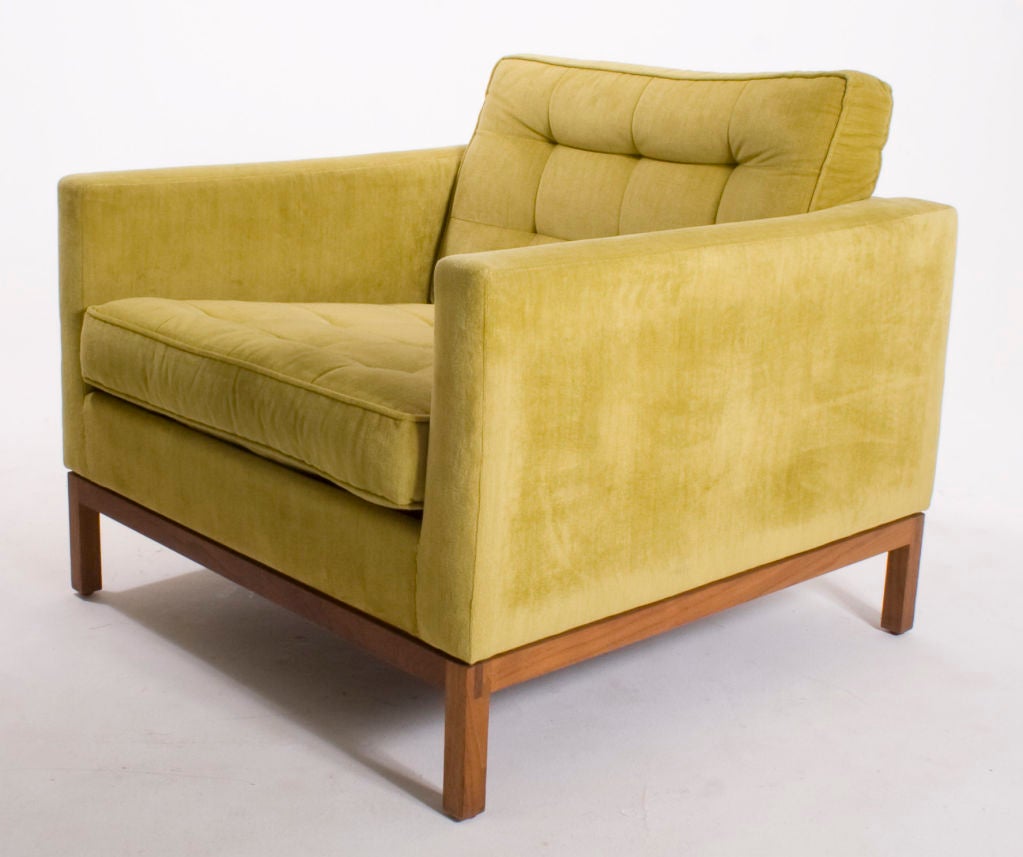 Pair of classic Florence Knoll lounge chairs with original pear colored cotton-velvet upholstery on rare wooden bases.