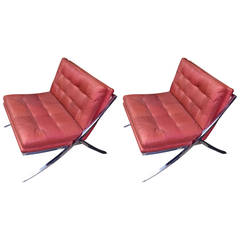 Sleek Pair of Heavy Chromed Steel and Red Leather Chairs