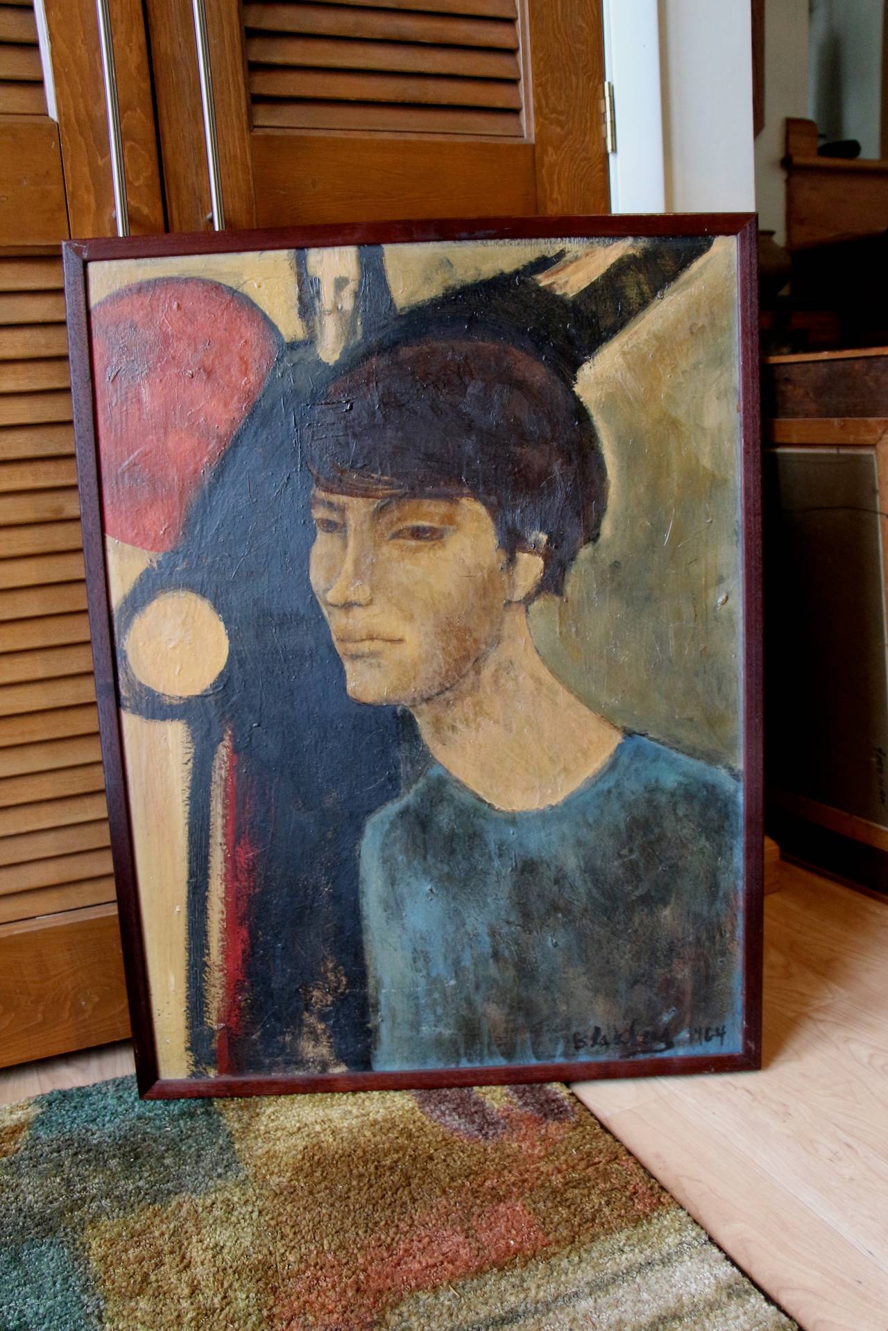 A moody and atmospheric portrait signed illegibly and dated 1964 lower right. It is on board in the original frame. Great painting.