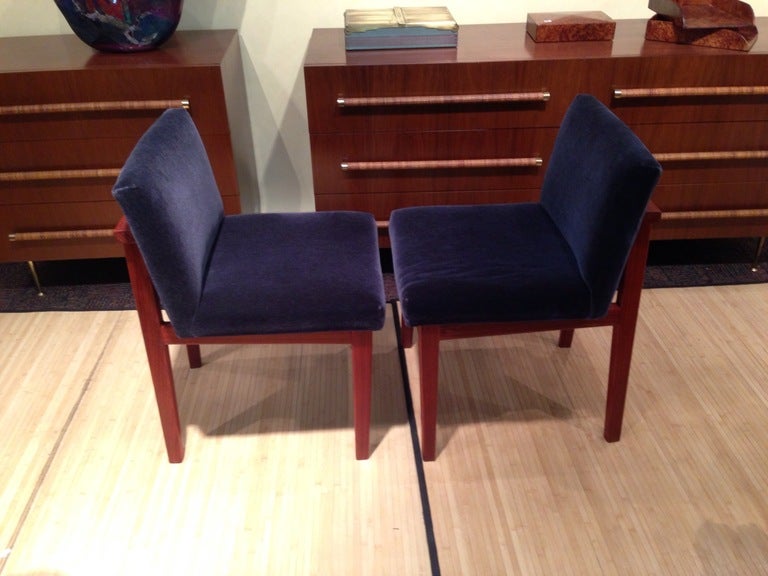 A great pair of African padauk wood craft made chairs recently re-upholstered in a grey wool mohair. Padauk is an exotic red African wood. Price is for a pair. They are elegantly designed and probably American craft movement from the 1980s.