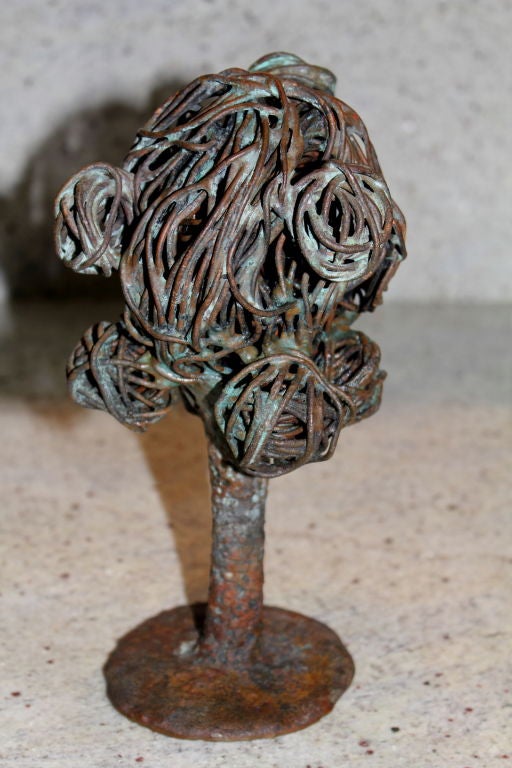 We bought this wonderful copper and bronze tree sculpture from an estate sale that was liquidating the assets of an art dealer, Lawrence Salander, who was recently indicted of defrauding his victims. This is from his personal collection and all I